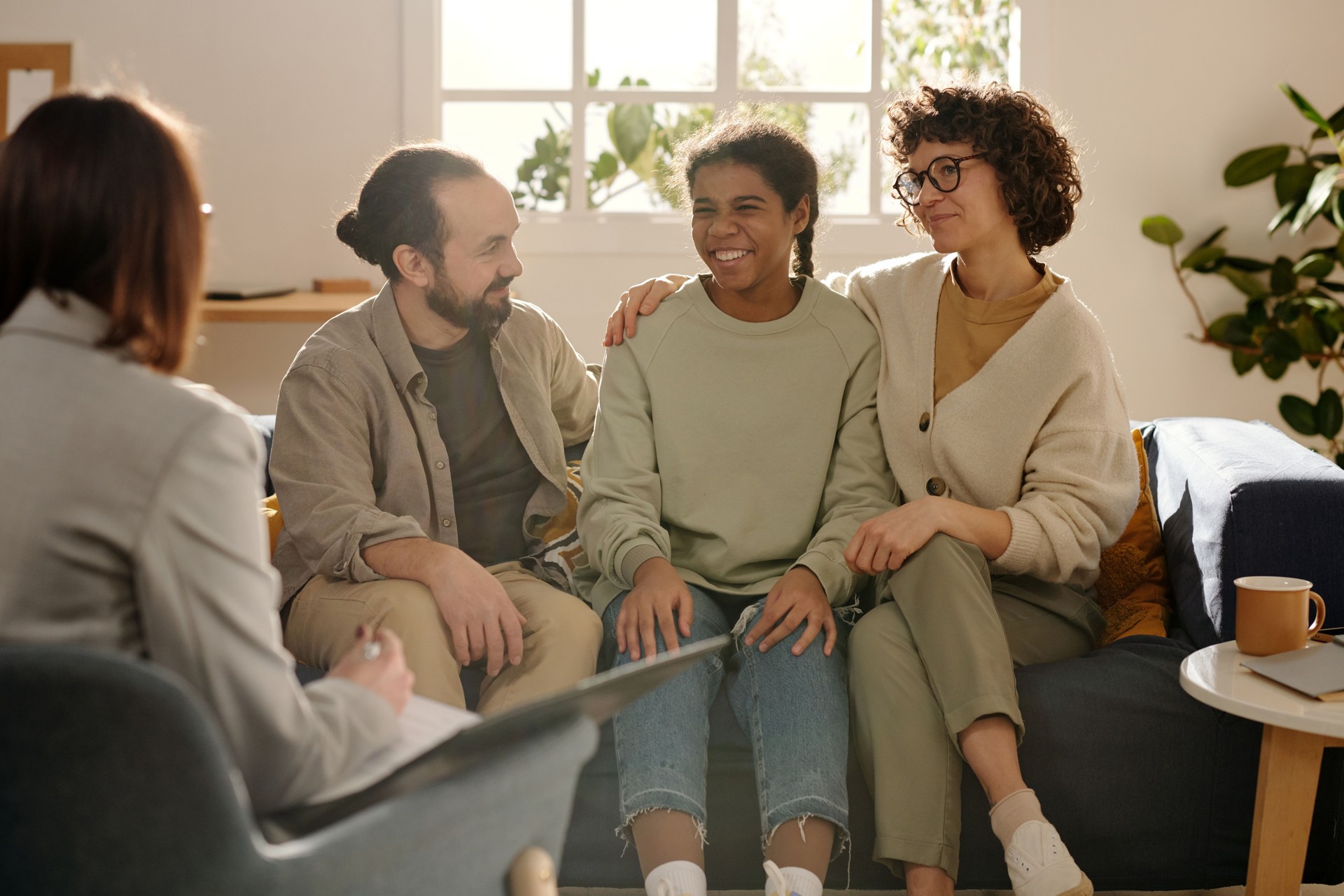 Foster parents talking to social worker